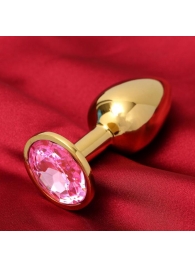 Золотистая анальная пробка с розовым кристаллом - Сима-Ленд - купить с доставкой в Москве