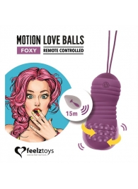 Фиолетовые вагинальные шарики с вращением бусин Remote Controlled Motion Love Balls Foxy - FeelzToys