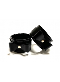 Черные наручники с бантиками из эко-кожи - БДСМ Арсенал - купить с доставкой #SOTBIT_REGIONS_UF_V_REGION_NAME#
