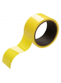 Желтый скотч для связывания Bondage Tape - 18 м. - California Exotic Novelties - купить с доставкой в Москве