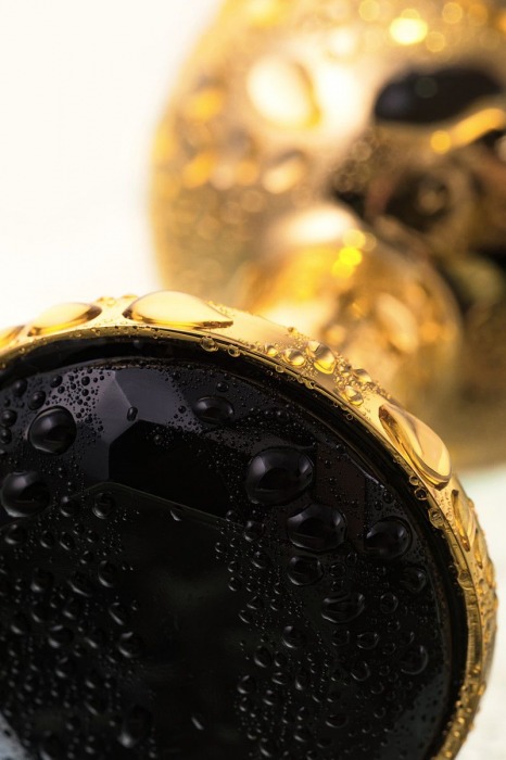 Маленькая золотистая анальная втулка с чёрным кристаллом - 7,2 см. - ToyFa - купить с доставкой в Москве