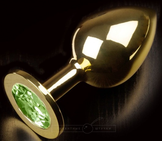 Золотистая анальная пробка с салатовым кристаллом - 9 см. - Пикантные штучки - купить с доставкой в Москве