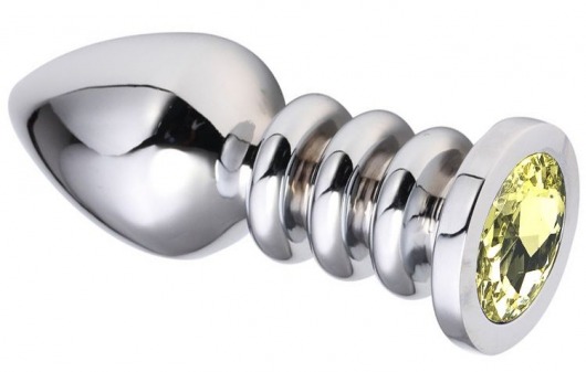 Серебристая анальная пробка на рельефной ножке с желтым кристаллом - 9 см. - Vandersex - купить с доставкой в Москве