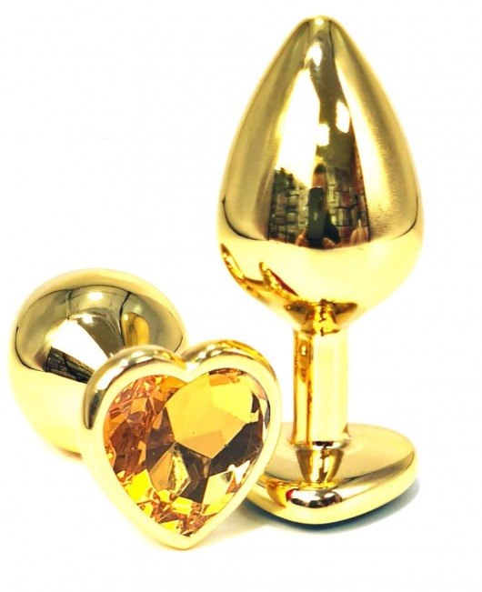 Золотистая анальная пробка с оранжевым кристаллом-сердцем - 7 см. - Vandersex - купить с доставкой в Москве