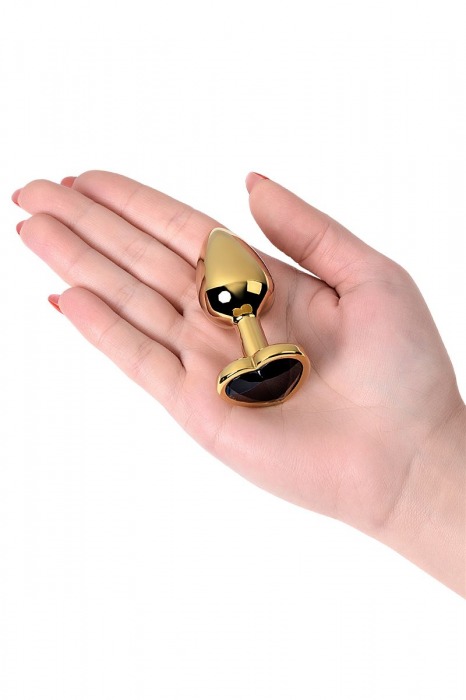 Золотистая коническая анальная пробка с черным кристаллом-сердечком - 7 см. - ToyFa - купить с доставкой в Москве