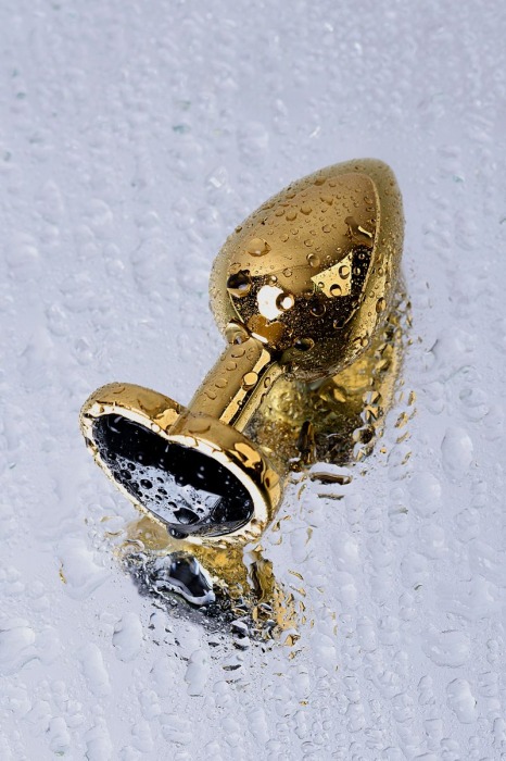 Золотистая коническая анальная пробка с черным кристаллом-сердечком - 7 см. - ToyFa - купить с доставкой в Москве