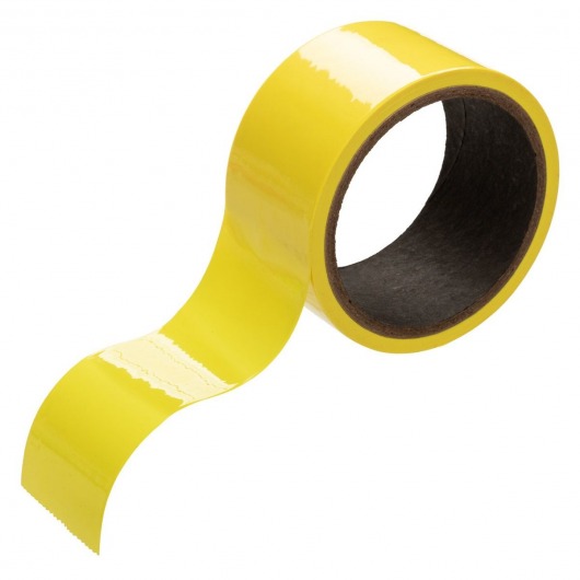 Желтый скотч для связывания Bondage Tape - 18 м. - California Exotic Novelties - купить с доставкой в Москве