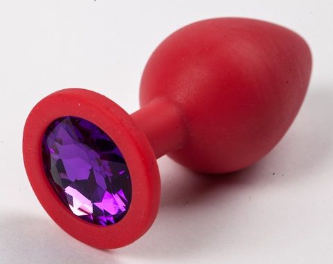 Красная силиконовая анальная пробка с фиолетовым стразом - 8,2 см. - 4sexdreaM - купить с доставкой в Москве
