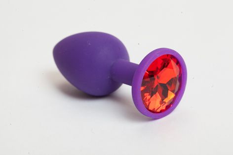 Фиолетовая силиконовая анальная пробка с красным стразом - 7,1 см. - 4sexdreaM - купить с доставкой в Москве
