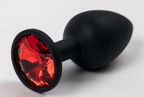 Черная силиконовая анальная пробка с красным стразом - 7,1 см. - 4sexdreaM - купить с доставкой в Москве