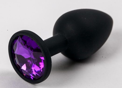 Черная силиконовая анальная пробка с фиолетовым стразом - 7,1 см. - 4sexdreaM - купить с доставкой в Москве