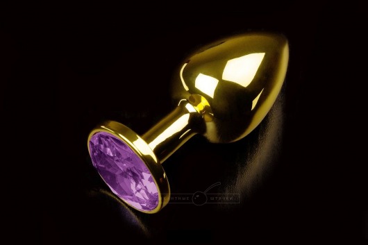 Маленькая золотистая анальная пробка с круглым кончиком и фиолетовым кристаллом - 7 см. - Пикантные штучки - купить с доставкой в Москве