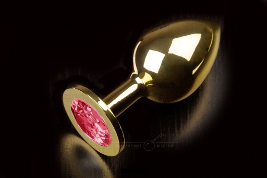Большая золотая анальная пробка с закругленным кончиком и рубиновым кристаллом - 9 см. - Пикантные штучки - купить с доставкой в Москве