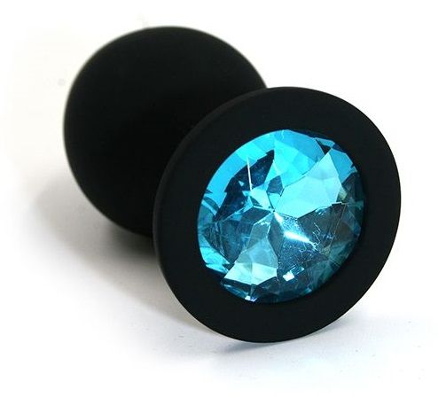 Чёрная силиконовая анальная пробка с голубым кристаллом - 7 см. - Kanikule - купить с доставкой в Москве